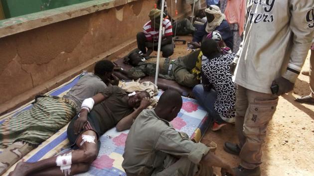 Wounded Malian troops receive medical treatment after being injured by an explosion at the Joint Operational Mechanism base in Gao, Mali, Wednesday, Jan 18. (AP) Wounded Malian troops receive medical treatment after being injured by an explosion at the Joint Operational Mechanism base in Gao, Mali, Wednesday, Jan 18. (AP)