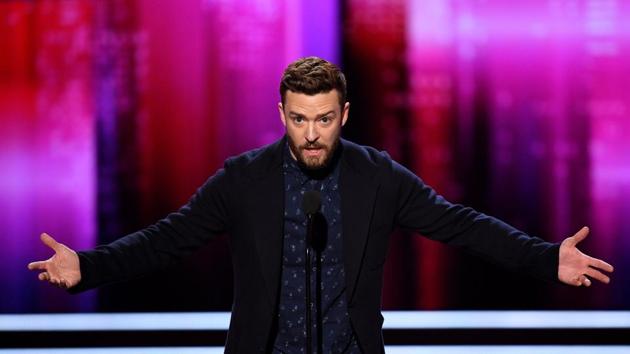 Singer/actor Justin Timberlake accepts Favourite Male Singer and Favourite Song for Can't Stop the Feeling! onstage during the People's Choice Awards 2017. (AFP)