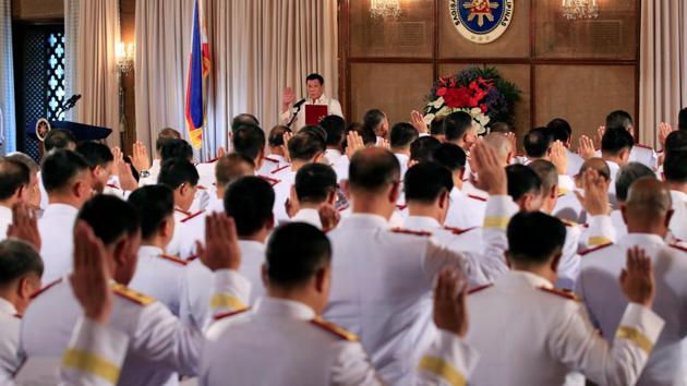 President Rodrigo Duterte (centre) leads the oath-taking of newly promoted officials of the Philippine National Police (PNP) at the Malacanang presidential palace in Manila on January 19, 2017. (Reuters) President Rodrigo Duterte (centre) leads the oath-taking of newly promoted officials of the Philippine National Police (PNP) at the Malacanang presidential palace in Manila on January 19, 2017. (Reuters)