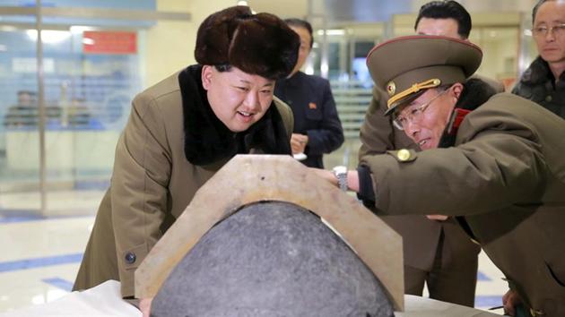 North Korean leader Kim Jong Un looks at a rocket warhead tip after a simulated test of atmospheric re-entry of a ballistic missile, at an unidentified location, in this undated photo released by North Korea's Korean Central News Agency (KCNA) . (Reuters Photo) North Korean leader Kim Jong Un looks at a rocket warhead tip after a simulated test of atmospheric re-entry of a ballistic missile, at an unidentified location, in this undated photo released by North Korea's Korean Central News Agency (KCNA) . (Reuters Photo)
