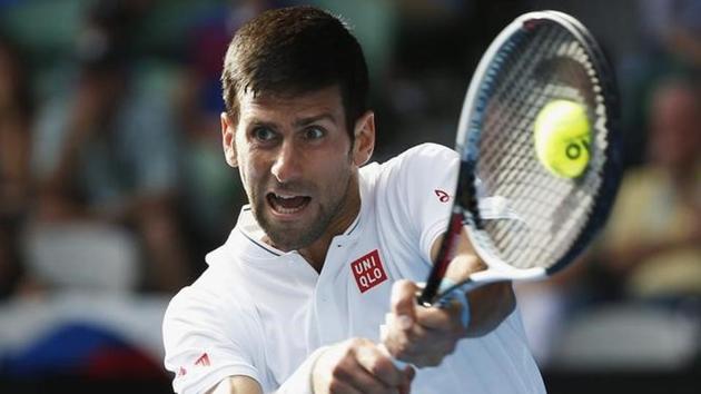 Novak Djokovic hits a shot during his second round match against Uzbekistan's Denis Istomin. Istomin shocked Djokovic 7-6, 5-7, 2-6, 7-6, 6-4.  (reuters) 