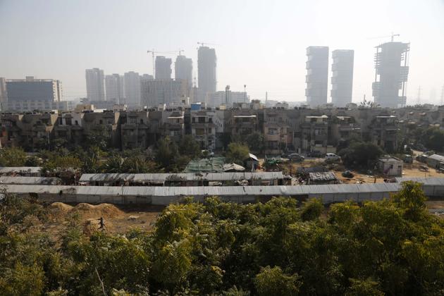 Over 100 huts have come up on nearly an acre of encroached land near Harmony Homes, Sushant Lok-3. (Sanchit Khanna/HT Photo) Over 100 huts have come up on nearly an acre of encroached land near Harmony Homes, Sushant Lok-3. (Sanchit Khanna/HT Photo)