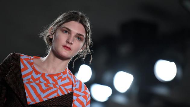 A model presents a creation by designer Vladimir Karaleev at the Berlin Fashion Week in Berlin on Thursday. (AFP) A model presents a creation by designer Vladimir Karaleev at the Berlin Fashion Week in Berlin on Thursday. (AFP)