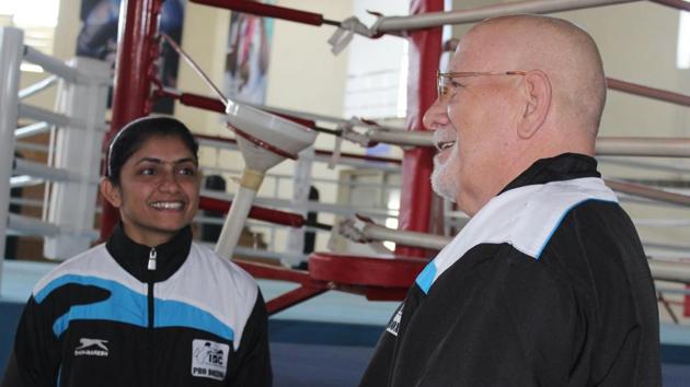 Boxer Pinki Jangra is cuurrently training under United States’ Joe Clough (right).(HT Photo)