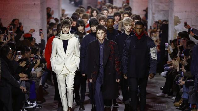 Models present creations by Dries Van Noten during men's Fashion Week for the Fall/Winter 2017/2018 collection in Paris on Thursday. (AFP) Models present creations by Dries Van Noten during men's Fashion Week for the Fall/Winter 2017/2018 collection in Paris on Thursday. (AFP)