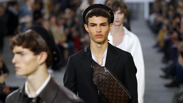 Models present creations by Vuitton during the men's Fashion Week for the Fall/Winter 2017/2018 collection on Thursday in Paris. (AFP) Models present creations by Vuitton during the men's Fashion Week for the Fall/Winter 2017/2018 collection on Thursday in Paris. (AFP)