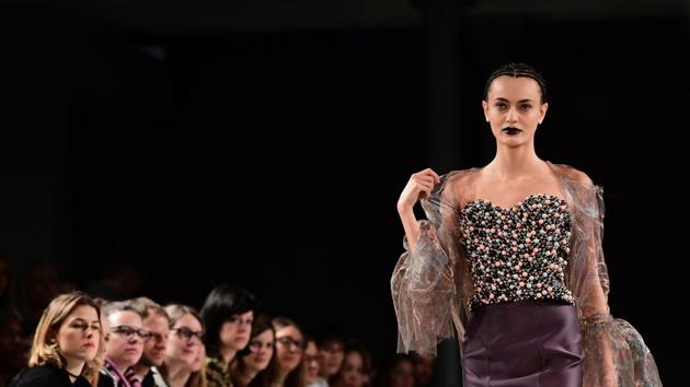 A model wears a creation by Marina Hoermanseder during the Berlin Fashion Week in Berlin on Thursday. (AFP) A model wears a creation by Marina Hoermanseder during the Berlin Fashion Week in Berlin on Thursday. (AFP)