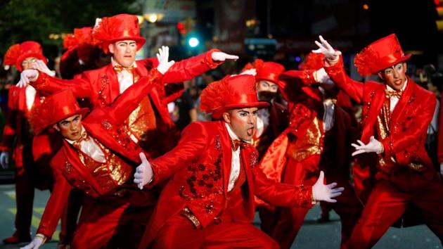 Members of an Uruguayan carnival group participate in the inaugural parade of the Uruguayan Carnival in Montevideo. The dancers, music, and characters all represent the slave struggle and resistance, the fight to hold on to their culture and memories. (Andres Stapff/ REUTERS) Members of an Uruguayan carnival group participate in the inaugural parade of the Uruguayan Carnival in Montevideo. The dancers, music, and characters all represent the slave struggle and resistance, the fight to hold on to their culture and memories. (Andres Stapff/ REUTERS)