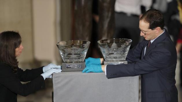 Officials prepare the Inaugural gifts ahead of a luncheon for President-elect Donald Trump at the US Capitol on January 20, 2017 in Washington, DC. (AFP) Officials prepare the Inaugural gifts ahead of a luncheon for President-elect Donald Trump at the US Capitol on January 20, 2017 in Washington, DC. (AFP)