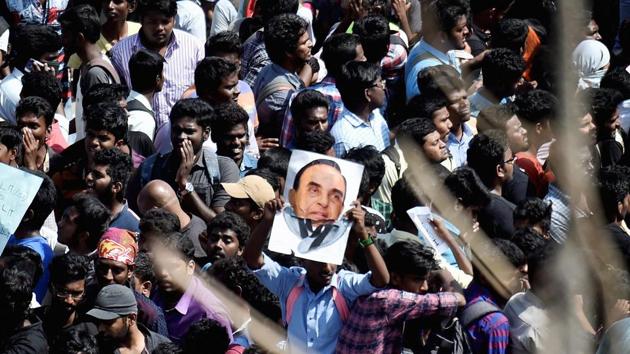 Students hold posters during a protest rally to lift the ban on Jallikattu and demanding a ban be imposed on PETA at Kamarajar Salai in Marina Beach in Chennai on Wednesday. (PTI Photo) Students hold posters during a protest rally to lift the ban on Jallikattu and demanding a ban be imposed on PETA at Kamarajar Salai in Marina Beach in Chennai on Wednesday. (PTI Photo)