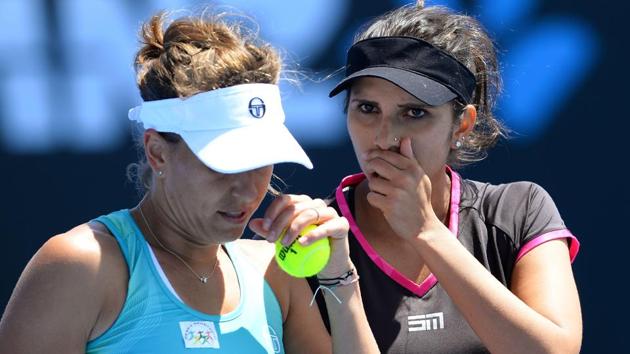 Sania Mirza and her partner Barbora Strycova advanced to the women’s doubles third round, but compatriot Rohan Bopanna was knocked out in the men’s doubles category. (AFP) Sania Mirza and her partner Barbora Strycova advanced to the women’s doubles third round, but compatriot Rohan Bopanna was knocked out in the men’s doubles category. (AFP)
