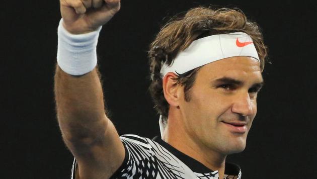 Roger Federer celebrates winning his Men's singles third round match against Czech Republic's Tomas Berdych. (REUTERS)