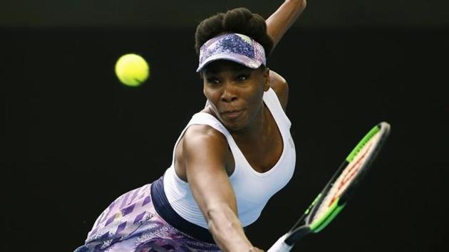 Venus Williams of the U.S hits a shot during her Women's singles third round match against China's Duan Ying-Ying. (REUTERS)