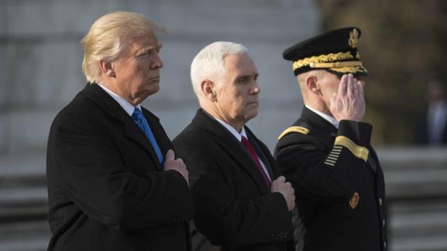 US President-elect Donald Trump and vice president-elect Mike Pence take part in a wreath-laying ceremony at Arlington National Cemetery in Arlington, Virginia. (AFP Photo) US President-elect Donald Trump and vice president-elect Mike Pence take part in a wreath-laying ceremony at Arlington National Cemetery in Arlington, Virginia. (AFP Photo)