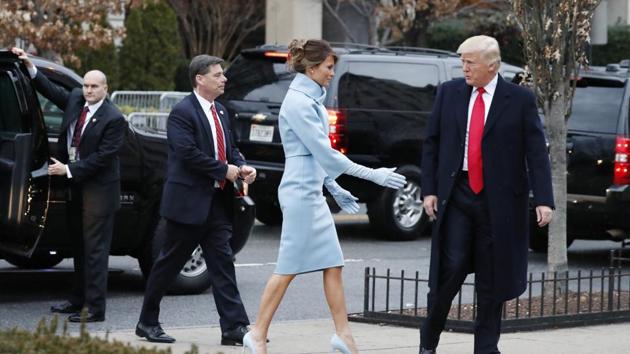 President-elect Donald Trump and his wife Melania, accompanied by their Secret Service detail, arrive for a church service at St John’s Episcopal Church across from the White House in Washington on January 20, 2017. (AP) President-elect Donald Trump and his wife Melania, accompanied by their Secret Service detail, arrive for a church service at St John’s Episcopal Church across from the White House in Washington on January 20, 2017. (AP)