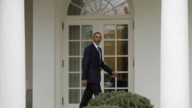Barack Obama walks from the Oval Office of the White House in Washington, perhaps for the last time as President of United States, before the start of presidential inaugural festivities on Friday, (AP) Barack Obama walks from the Oval Office of the White House in Washington, perhaps for the last time as President of United States, before the start of presidential inaugural festivities on Friday, (AP)
