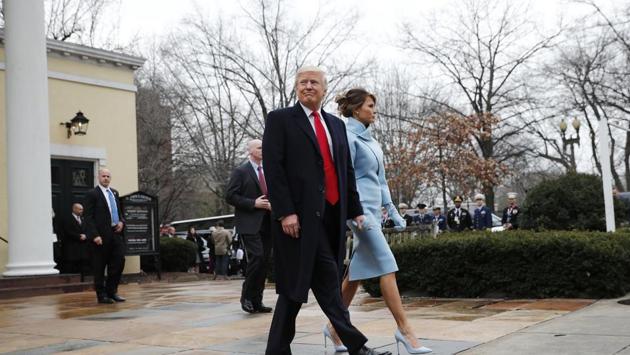 President-elect Donald Trump and his wife Melania leave a church service at St. John’s Episcopal Church across from the White House in Washington on Friday. (AP) President-elect Donald Trump and his wife Melania leave a church service at St. John’s Episcopal Church across from the White House in Washington on Friday. (AP)