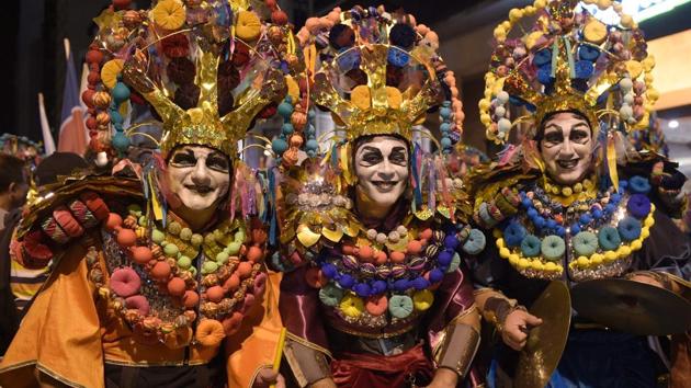 Performers participate in the opening parade of the Uruguayan carnival -- the world’s longest -- in Montevideo. (MIGUEL ROJO / AFP) Performers participate in the opening parade of the Uruguayan carnival -- the world’s longest -- in Montevideo. (MIGUEL ROJO / AFP)