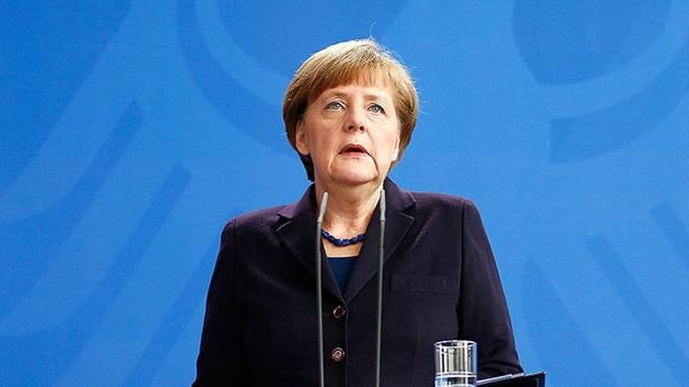 German Chancellor Angela Merkel reacts as she makes a statement in Berlin. (Reuters Photo)