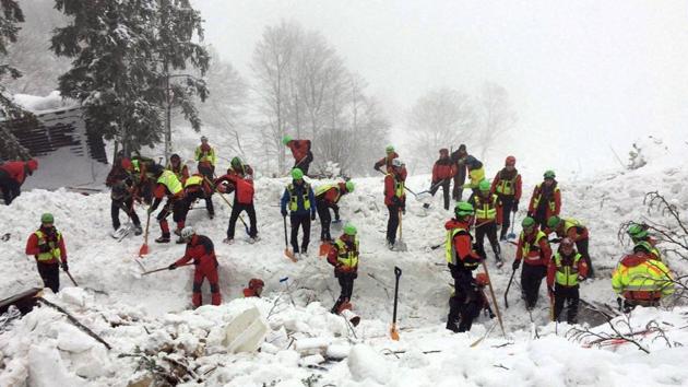 Rescuers work in the area of the avalanche-hit Rigopiano hotel, central Italy, on Saturday. After two days huddled in freezing cold, tons of snow surrounding them in the wreckage of the hotel, survivors greeted their rescuers Friday as "angels." (AP Photo) Rescuers work in the area of the avalanche-hit Rigopiano hotel, central Italy, on Saturday. After two days huddled in freezing cold, tons of snow surrounding them in the wreckage of the hotel, survivors greeted their rescuers Friday as "angels." (AP Photo)