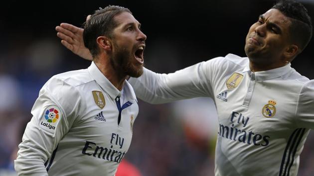 Real Madrid CF beat Malaga CF 2-1 in their La Liga encounter thanks to two goals from Sergio Ramos. (AP) Real Madrid CF beat Malaga CF 2-1 in their La Liga encounter thanks to two goals from Sergio Ramos. (AP)