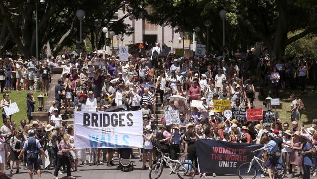 People gather at Hyde Park during the Women's March rally in Sydney, Australia, Saturday, Jan. 21, 2017. Protesters at the Women's March rally carried placards with slogans including "Women of the world resist," ''Feminism is my trump card" and "Fight like a girl." (AP Photo) People gather at Hyde Park during the Women's March rally in Sydney, Australia, Saturday, Jan. 21, 2017. Protesters at the Women's March rally carried placards with slogans including "Women of the world resist," ''Feminism is my trump card" and "Fight like a girl." (AP Photo)