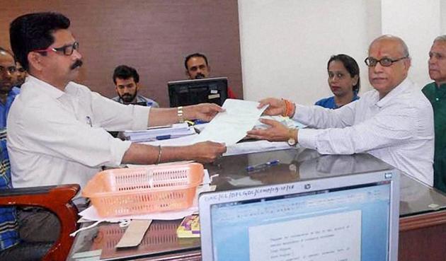 Former Goa chief minister Digambar Kamat files his nomination papers from Margao constituency for the upcoming assembly polls. (PTI File Photo) Former Goa chief minister Digambar Kamat files his nomination papers from Margao constituency for the upcoming assembly polls. (PTI File Photo)