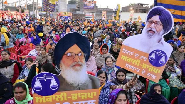 AkaliBJP supporters holding chief minister Parkash Singh Badal’s cutouts at a political rally in Amritsar on Friday. Deputy CM Sukhbir Singh Badal addressed the event that was organised in support of SAD’s Amritsar South candidate Gurpratap Singh Tikka. (Sameer Sehgal/HT Photo) AkaliBJP supporters holding chief minister Parkash Singh Badal’s cutouts at a political rally in Amritsar on Friday. Deputy CM Sukhbir Singh Badal addressed the event that was organised in support of SAD’s Amritsar South candidate Gurpratap Singh Tikka. (Sameer Sehgal/HT Photo)