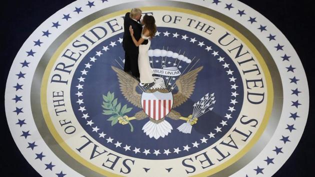 US President Donald Trump and his wife, first lady Melania Trump, dance at the "Salute to Our Armed Forces" inaugural ball during inauguration festivities in Washington, U.S. (Rick Wilking/REUTERS) US President Donald Trump and his wife, first lady Melania Trump, dance at the "Salute to Our Armed Forces" inaugural ball during inauguration festivities in Washington, U.S. (Rick Wilking/REUTERS)