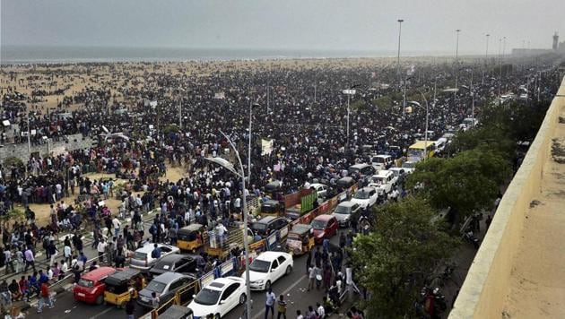 Protestors participate in an agitation to lift the ban on Jallikattu at Marina Beach in Chennai. (PTI) Protestors participate in an agitation to lift the ban on Jallikattu at Marina Beach in Chennai. (PTI)