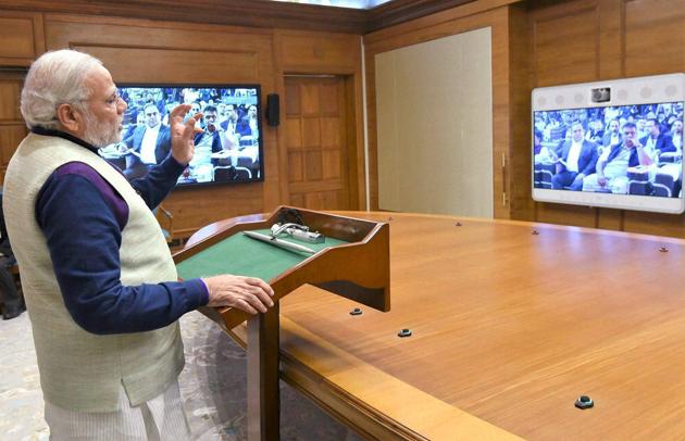 Prime Minister Narendra Modi addresses the conference of Central and state/ UT ministers and secretaries of tourism, culture and sports at Rann of Kutch, through video conferencing, in New Delhi on Friday. (PTI Photo) Prime Minister Narendra Modi addresses the conference of Central and state/ UT ministers and secretaries of tourism, culture and sports at Rann of Kutch, through video conferencing, in New Delhi on Friday. (PTI Photo)