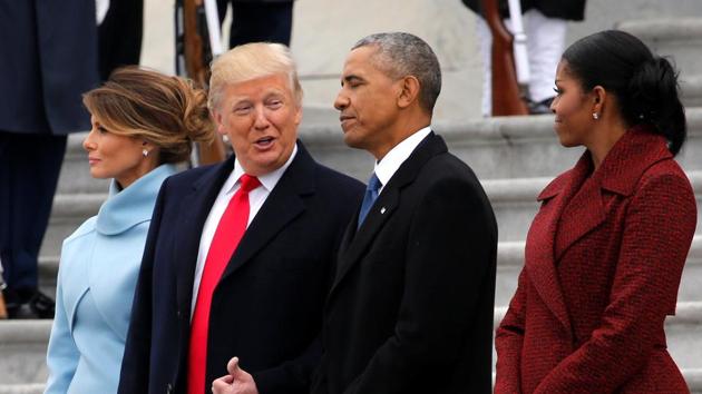 US President Donald Trump and first lady Melania Trump see off their predecessors Barack and Michelle Obama as they depart following Trump's inauguration at the Capitol in Washington. (Reuters) US President Donald Trump and first lady Melania Trump see off their predecessors Barack and Michelle Obama as they depart following Trump's inauguration at the Capitol in Washington. (Reuters)
