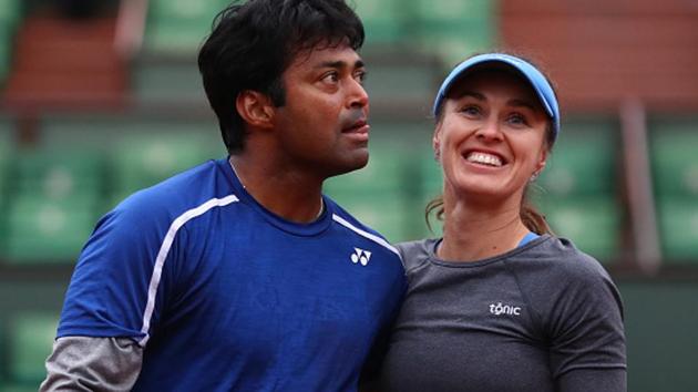 Leander Paes and Martina Hingis of Switzerland beat Australian pair of Marc Polmans and Destanee Aiava 6-4, 6-3 to enter the mixed doubles round of 16 at the Australian Open. Meanwhile, Sania Mirza and Barbora Strycova crashed out in the third round of the women’s doubles event on Sunday.(Getty Images)