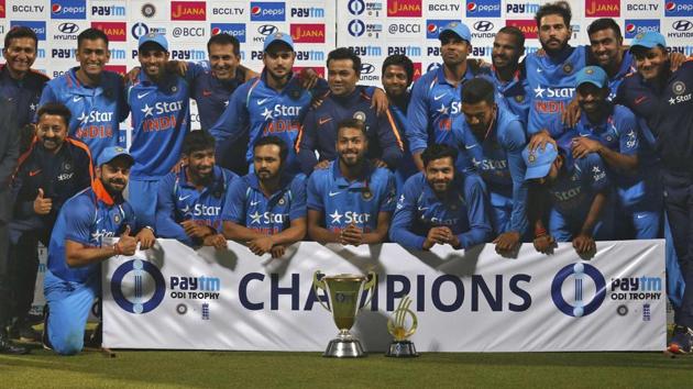 India's players pose with the trophy after winning the series 2-1 against England. (REUTERS) India's players pose with the trophy after winning the series 2-1 against England. (REUTERS)