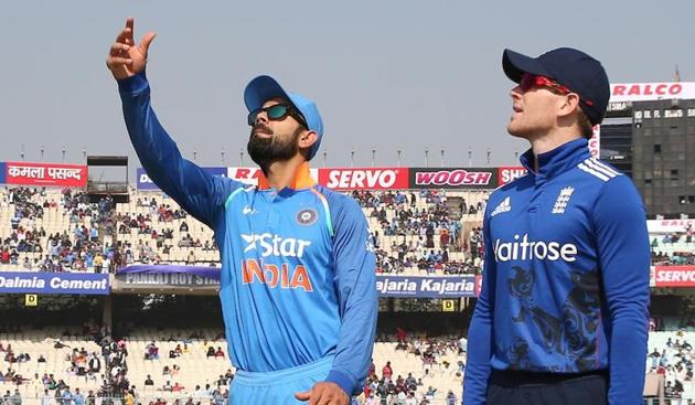 Virat Kohli and Eoin Morgan at the toss of India vs England third ODI in Kolkata in Sunday.(BCCI)