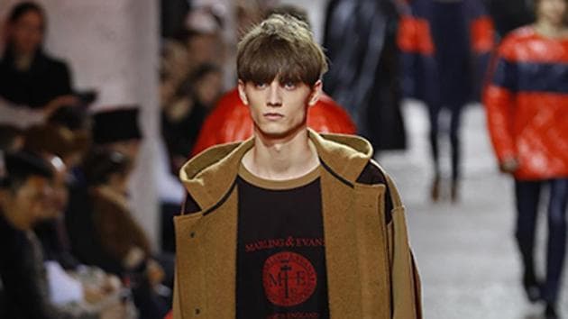 Vibrant pants in patent textures were the focus at Dries Van Noten, juxtaposed with sombre outerwear. (AFP) Vibrant pants in patent textures were the focus at Dries Van Noten, juxtaposed with sombre outerwear. (AFP)