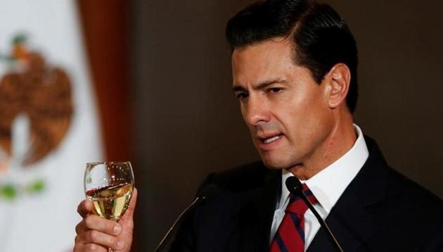 Mexico's President Enrique Pena Nieto makes a toast during a meeting with members of the diplomatic corps in Mexico City. (Reuters) Mexico's President Enrique Pena Nieto makes a toast during a meeting with members of the diplomatic corps in Mexico City. (Reuters)