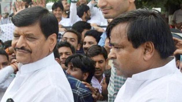 Samajwadi Party leader Shivpal Yadav with Gayatri Prajapati (R) during a party meet in Lucknow in September 2016. (PTI File Photo)