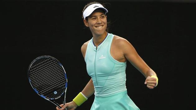 Coco Vandeweghe will face seventh seed Garbine Muguruza, seen here celebrating her 6-2, 6-3 win against Romania's Sorana Cirstea. (REUTERS)