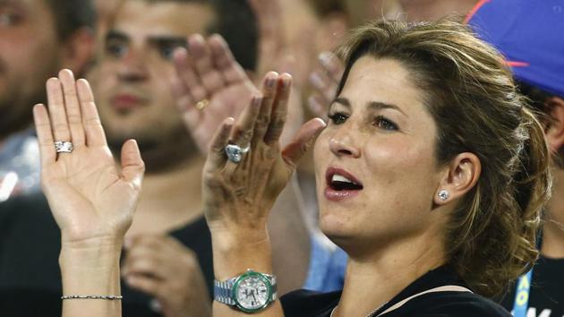 Watching Federer from the stands was his wife Mirka. Here she is seen applauding his win against Kei Nishikori on Sunday. (REUTERS)