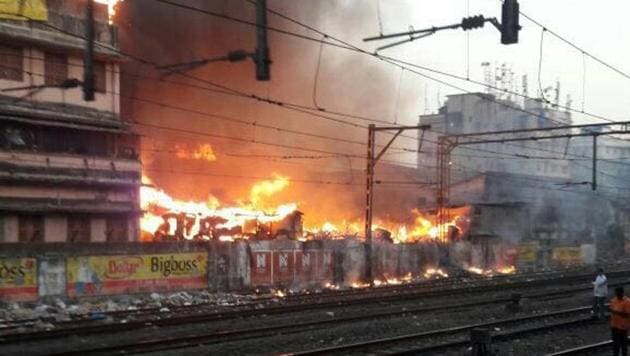 A few shanties between Masjid station and Chhatrapati Shivaji Terminus, along the seventh line, caught fire around 6am and it soon spread to 15-20 huts. (HT photo) A few shanties between Masjid station and Chhatrapati Shivaji Terminus, along the seventh line, caught fire around 6am and it soon spread to 15-20 huts. (HT photo)