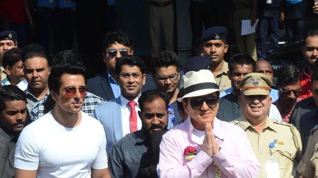 In India, do what Indians do. Jackie Chan greets people with a namaste.