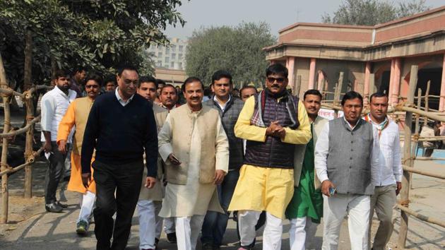 Dhirendra Singh (in yellow kurta) at the Greater Noida collectorate to file his nomination. (HT Photo) Dhirendra Singh (in yellow kurta) at the Greater Noida collectorate to file his nomination. (HT Photo)