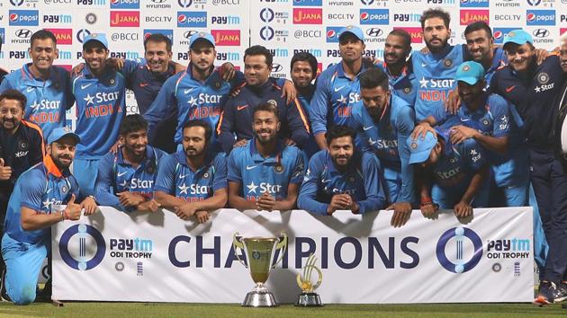 The India cricket team poses with the trophy after winning the ODI series against England. (BCCI) 