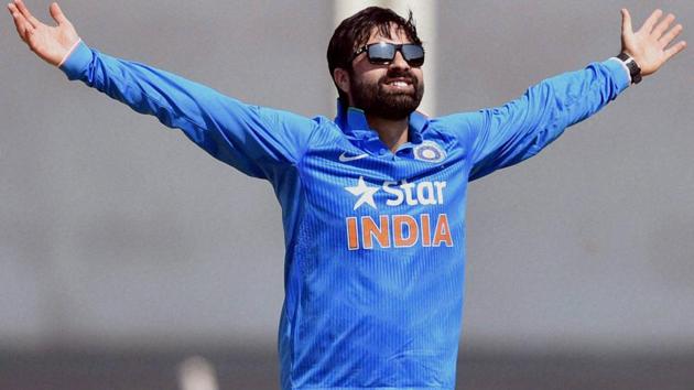 Parvez Rasool was introduced in the India cricket team for their upcoming T20I series against England in place of Ravichandran Ashwin. (PTI) Parvez Rasool was introduced in the India cricket team for their upcoming T20I series against England in place of Ravichandran Ashwin. (PTI)