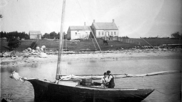 In this 1891 photo released by the National Oceanic and Atmospheric Administration, Penobscot Bay fishermen clean mackerel near their saltwater farm off the Maine coast. (AP Photo) In this 1891 photo released by the National Oceanic and Atmospheric Administration, Penobscot Bay fishermen clean mackerel near their saltwater farm off the Maine coast. (AP Photo)