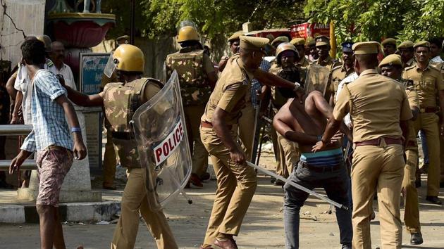Chennai Police lathicharge to disperse protesters during a violent clash near Marina Beach in Chennai on January 23, 2017. (PTI) Chennai Police lathicharge to disperse protesters during a violent clash near Marina Beach in Chennai on January 23, 2017. (PTI)