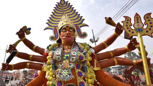 An artists from Tamil Nadu showcase ‘Karakattam’, a popular folk dance and an important event in temple festival celebrations especially in Amman Temple festivals in the rural areas of the state. (Arvind Yadav/HT PHOTO)