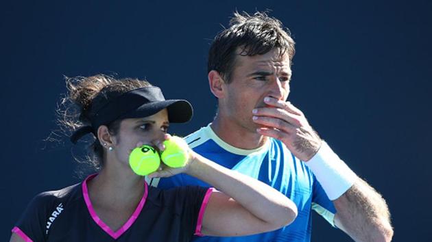 Sania Mirza of India and Ivan Dodig of Croatia during their mixed doubles Round 2 match at the Australian Open on Tuesday. (Getty Images) Sania Mirza of India and Ivan Dodig of Croatia during their mixed doubles Round 2 match at the Australian Open on Tuesday. (Getty Images)