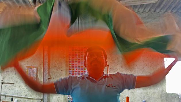 It’s a whirl of four colours at a workshop in Vasai where the Indian National Flag is being made. (Satyabrata Tripathy/HT photo) 